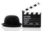 Bowler hat and movie clapper