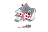 Miniature house with a key