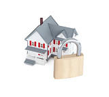 Concept images of a miniature grey house with a padlock