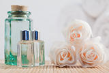 Roses and glass flasks