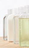 Close up of four massage oil bottles