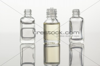 Glass flasks against a white background