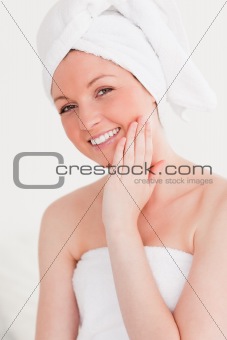 Good looking young woman  wearing towel