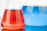 Blue and red beakers