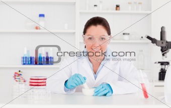 Young scientist preparing an experimentation looking at the came