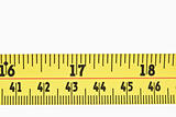 Close up of a part of a yellow measuring tape