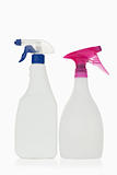 Pink and blue spray bottles