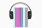 Close up of books and headphones
