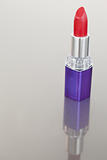 Portrait of a lipstick with a purple tube