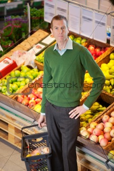 Portrait of serious man in shopping centre