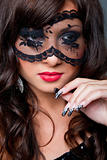 attractive brunette with  acy mask on eyes