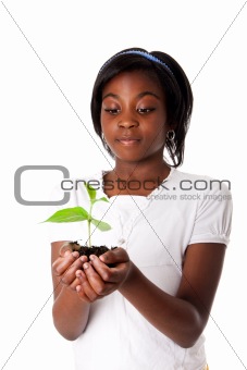 Girl with plant in hand