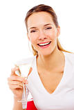 Young woman drinking a cocktail on white background studio