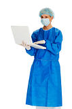 female surgeon holding laptop