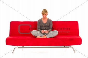 woman with mp3 on the sofa