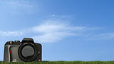 digital camera on grass