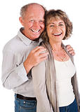 Happy senior couple smiling at camera