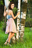 Girl in a birch grove 