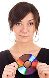 Young woman holding audio disk