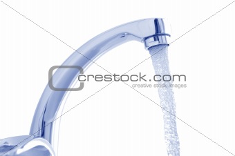 Water flowing from the faucet against the white background