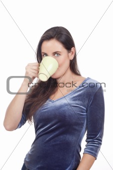beautiful young woman holding a cup of coffee, drinking - isolated on white 