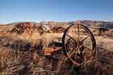 Old rustic farm equipment -- metal mechanical industrial worn wheel