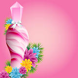 Perfume bottle and flowers