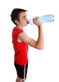 Teenager drinking bottled water