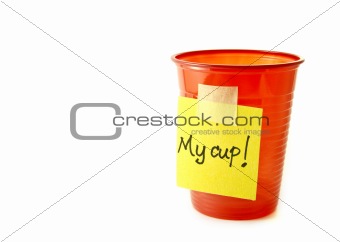 Red party cup with a sign