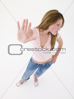 Teenage girl with hand up