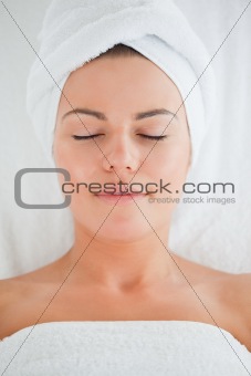 Portrait of a cute woman wearing a towel