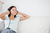 Lovely brunette listening to music