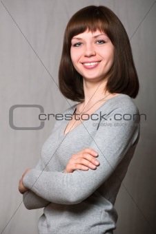 Attractive woman with her arms crossed