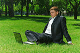Young businessman in the park