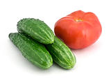 three cucumbers and tomato