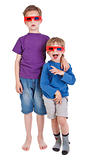 two boys wearing 3D glasses