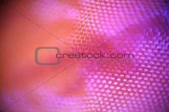 Macro detail of pink synthetic fabric