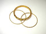 Perspective of Gold Bangles