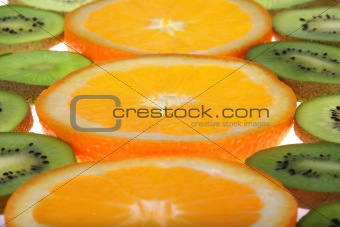 Background oranges and kiwi