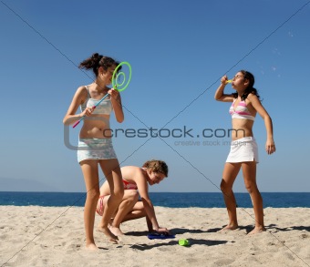 Girls playing on the beach