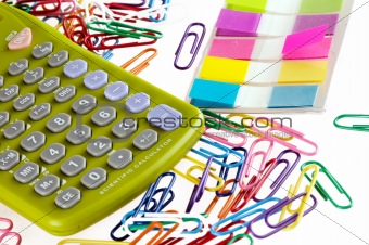 isolated paper clips calculater tabs office supplies