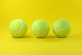 three yellow balls