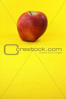 red apple in yellow