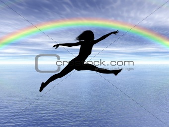 Jumping woman in the rainbow