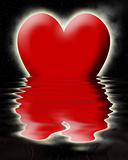 Red heart sinking in the ocean