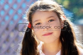 A little girl smiling