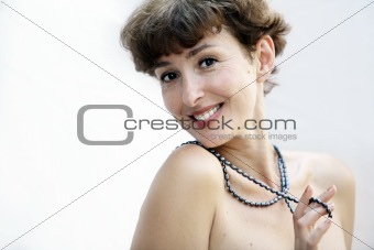 Mature woman with a pearl necklace