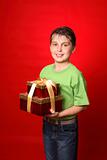 Boy carrying gifts