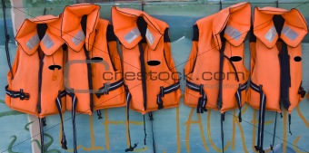 Row of orange life jackets