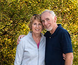 Loving senior couple embracing outdoors